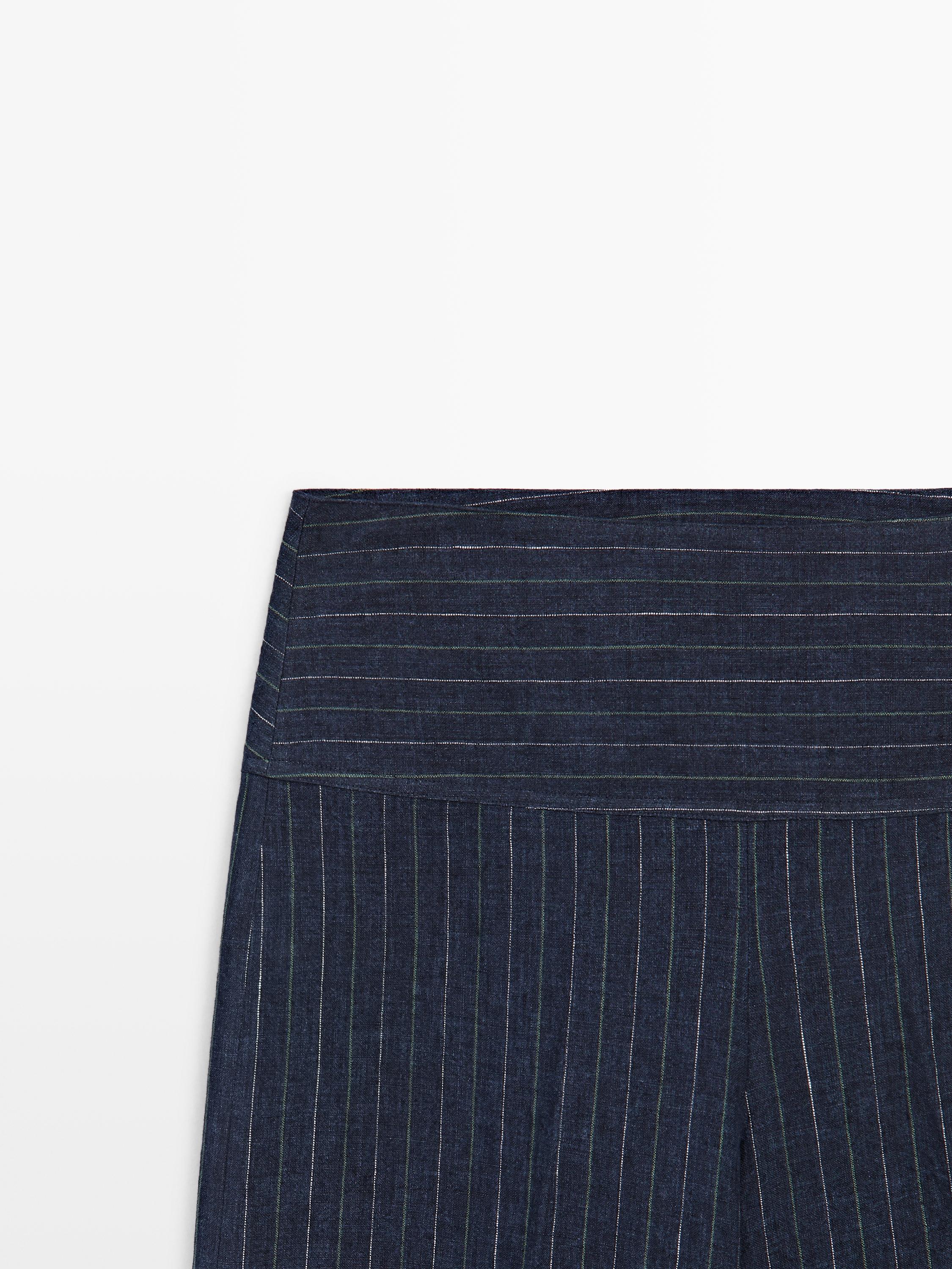 Flare fit linen trousers with striped details